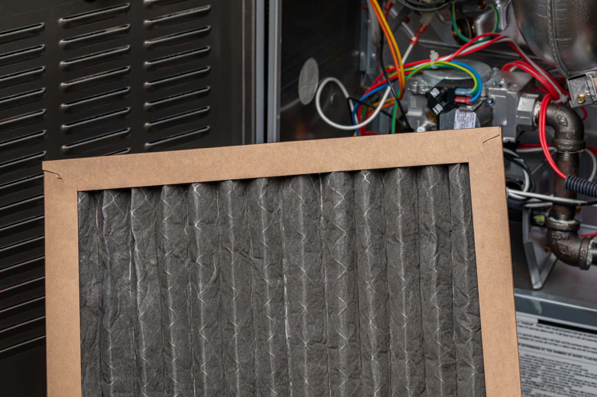 Dirty furnace filter. HVAC maintenance, indoor pollen allergy and duct cleaning concept, Furnace Short Cycling.