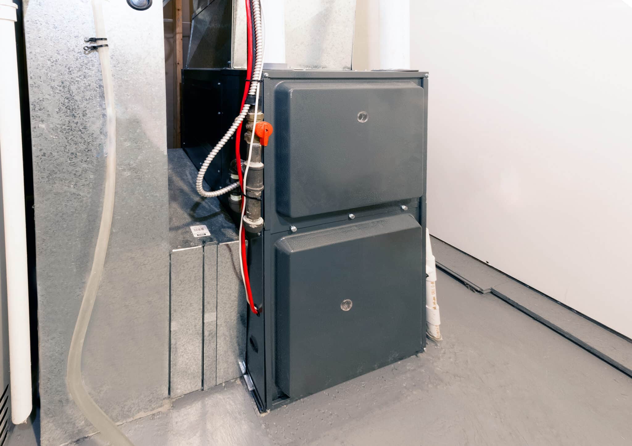 A home high energy efficient furnace in a basement, Heat Pump.