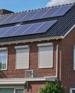 energy-efficient heat pump installation on a house with solar panels, Heating Options.